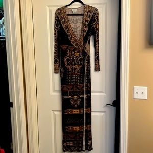 This beautiful camilla dress!  Only worn once!  It is a stretchy material.